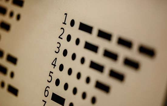 Close up of some numbers followed by dots and dashes