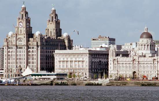 A view of Liverpool's city skyline from across the water.